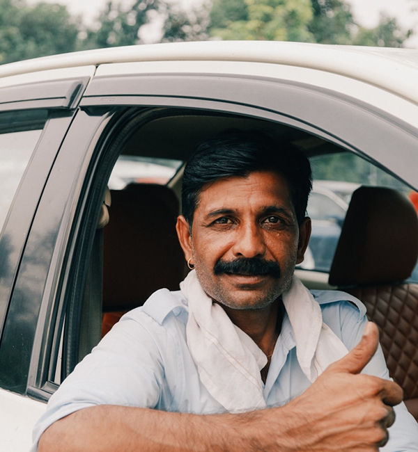 Professional FleetFlyer driver — safety-trained and police verified